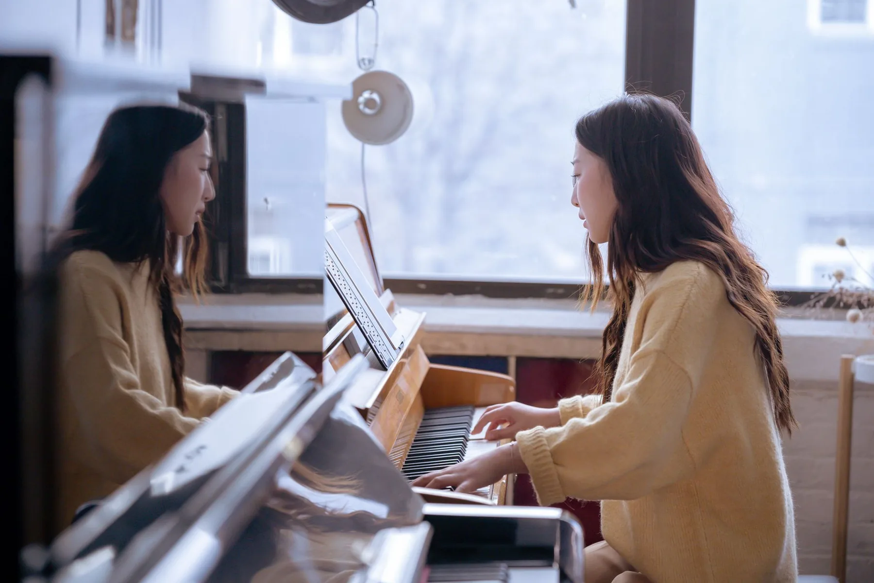 Pianist studying sheet music Pianist studying sheet music