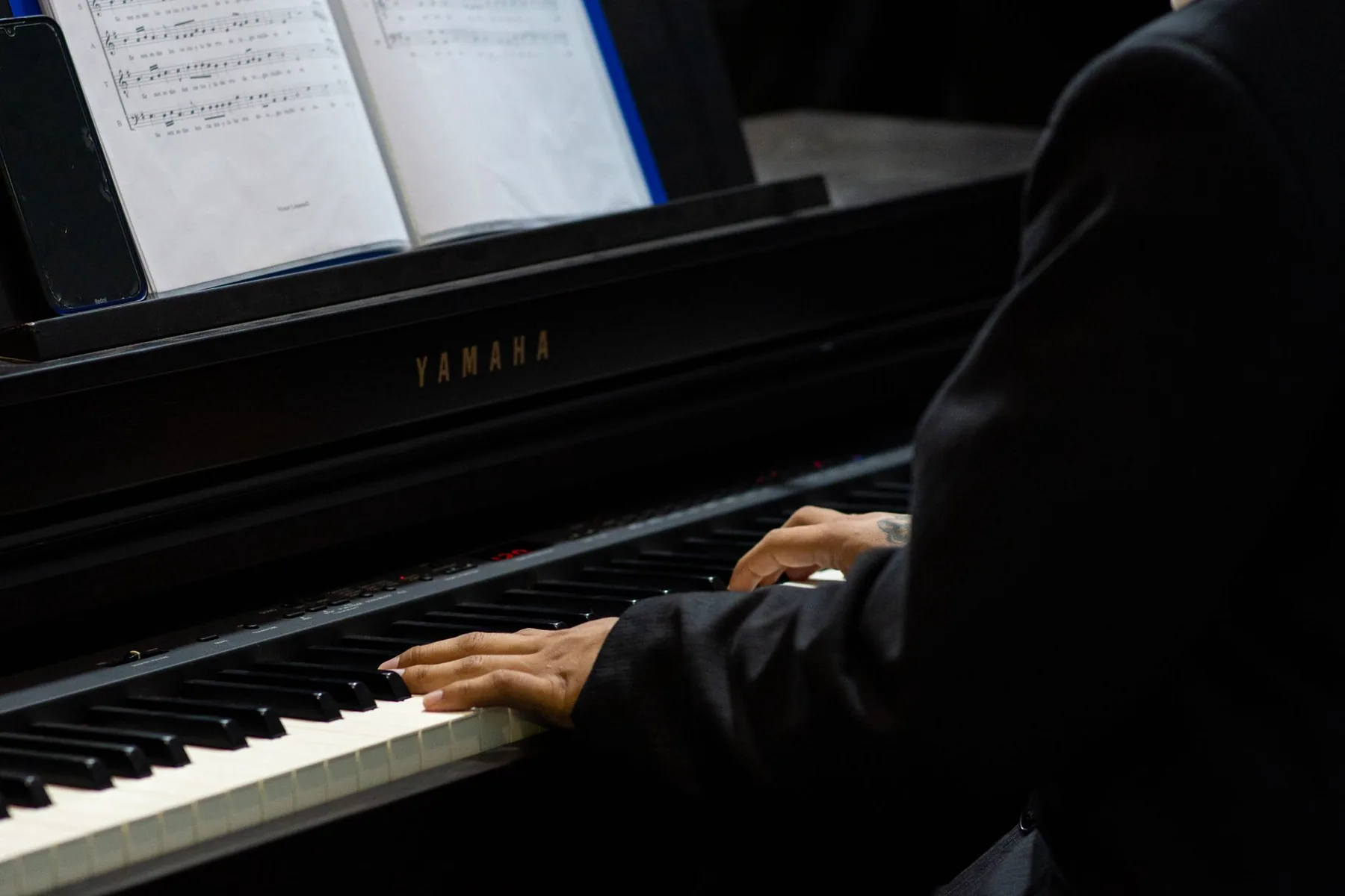 Pianist playing during a recital Pianist playing during a recital
