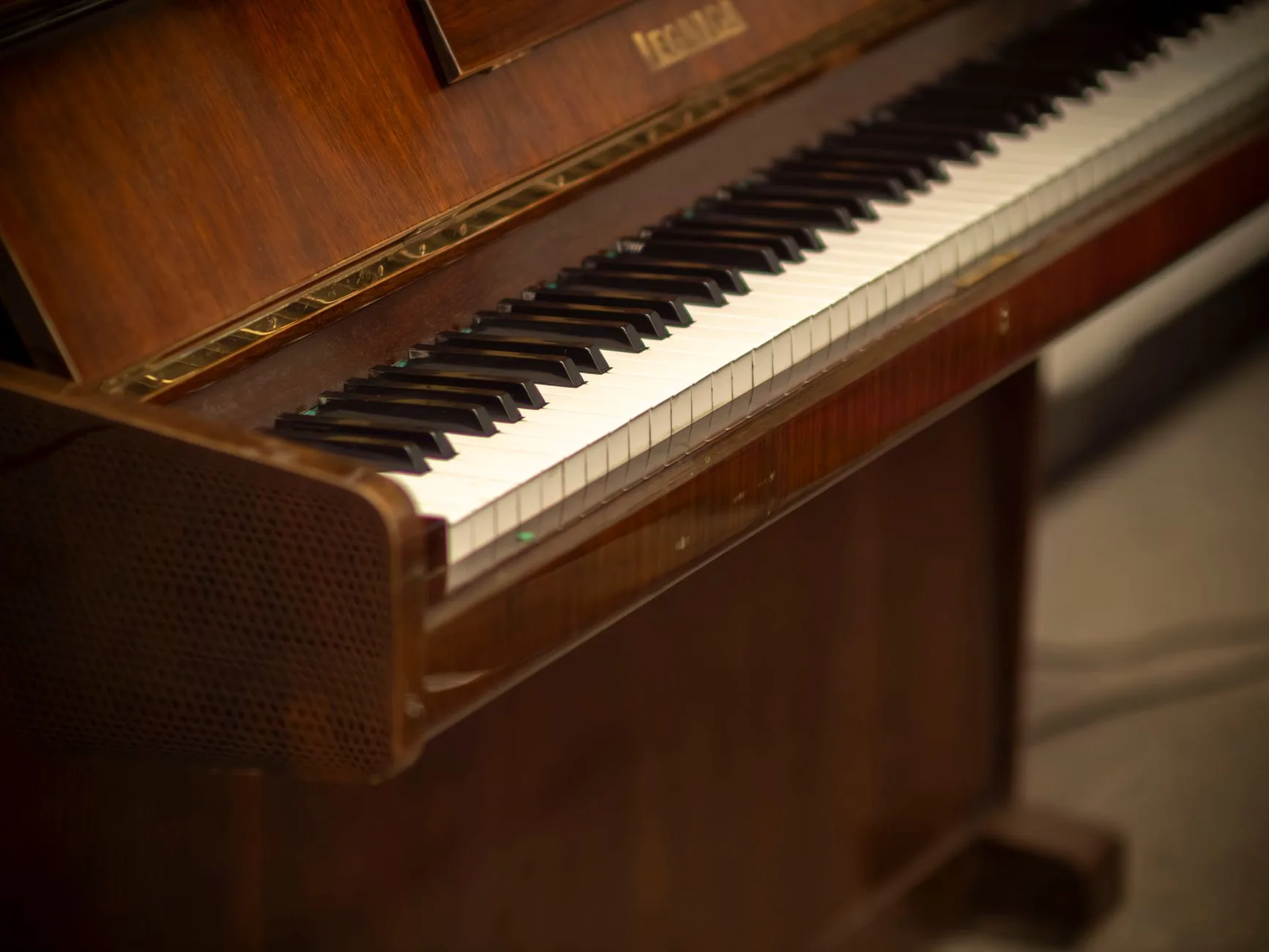 Keyboard of an antique upright piano Keyboard of an antique upright piano