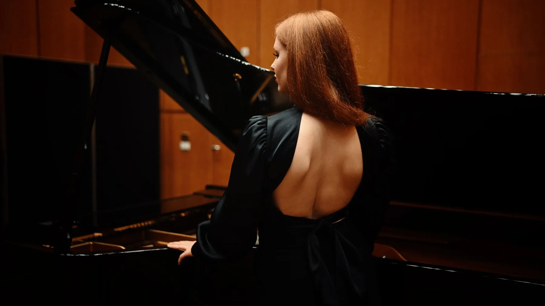 Pianist at a grand piano Pianist at a grand piano