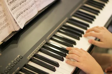 How to Adjust the Heavy Touch on a Yamaha P115 Piano