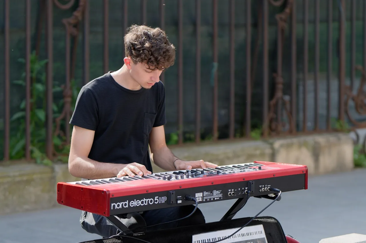 Musician playing a digital piano