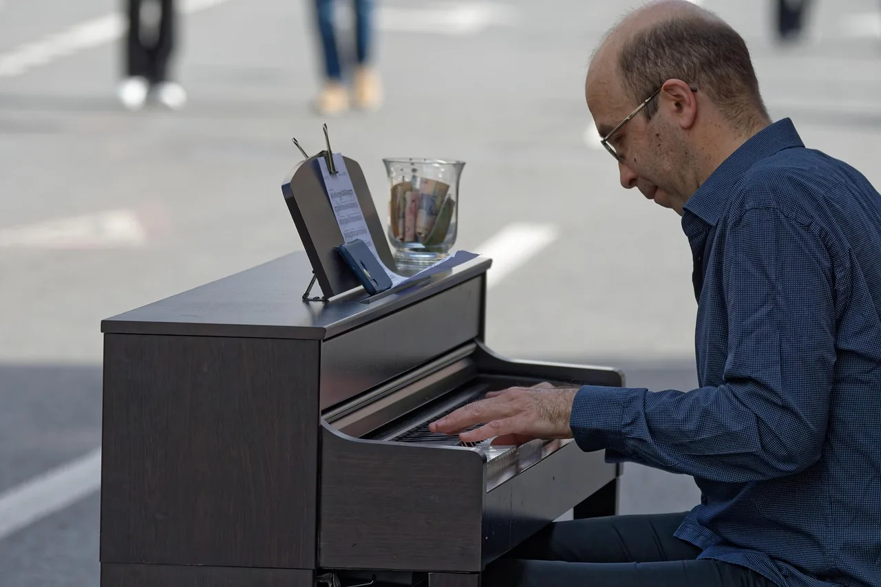 Pianist seated at the piano Pianist seated at the piano
