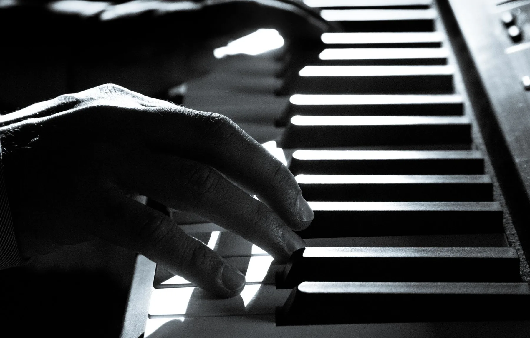 Determined pianist playing the keyboard Determined pianist playing the keyboard