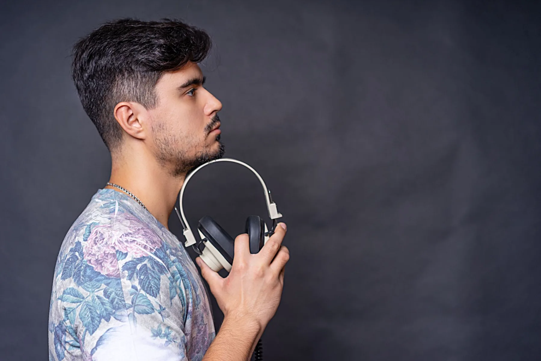 Man holding headphones
