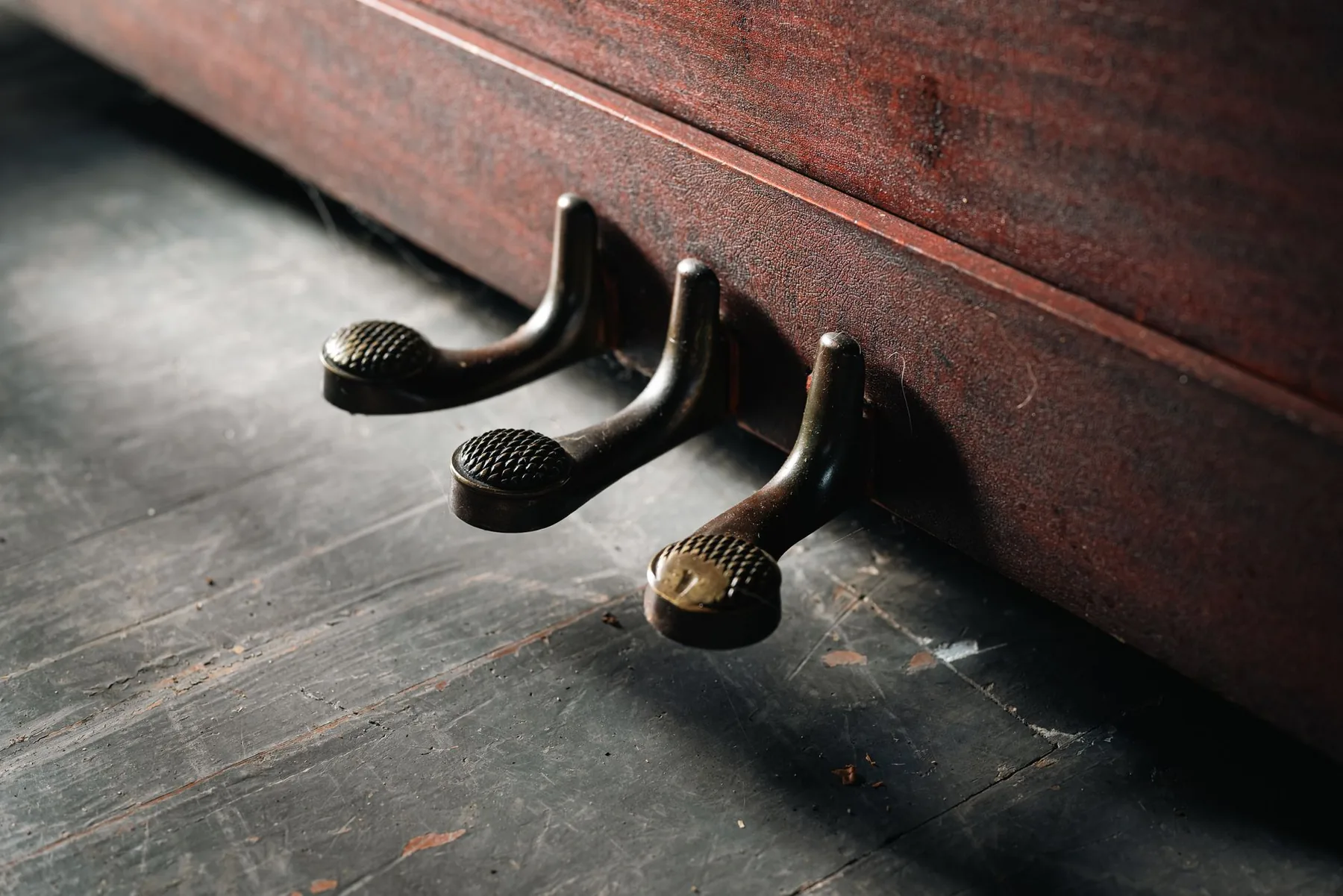 Old pedals on an acoustic piano Old pedals on an acoustic piano