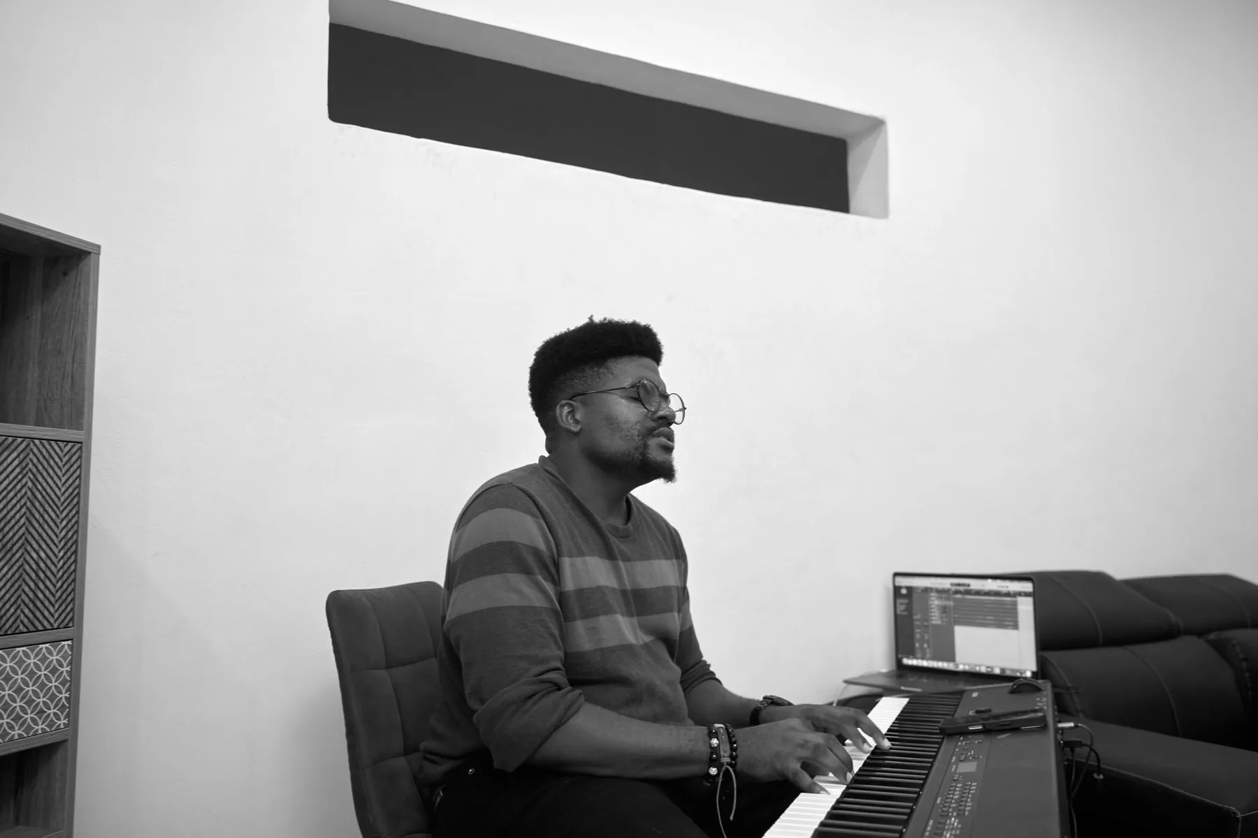 Musician playing a digital piano