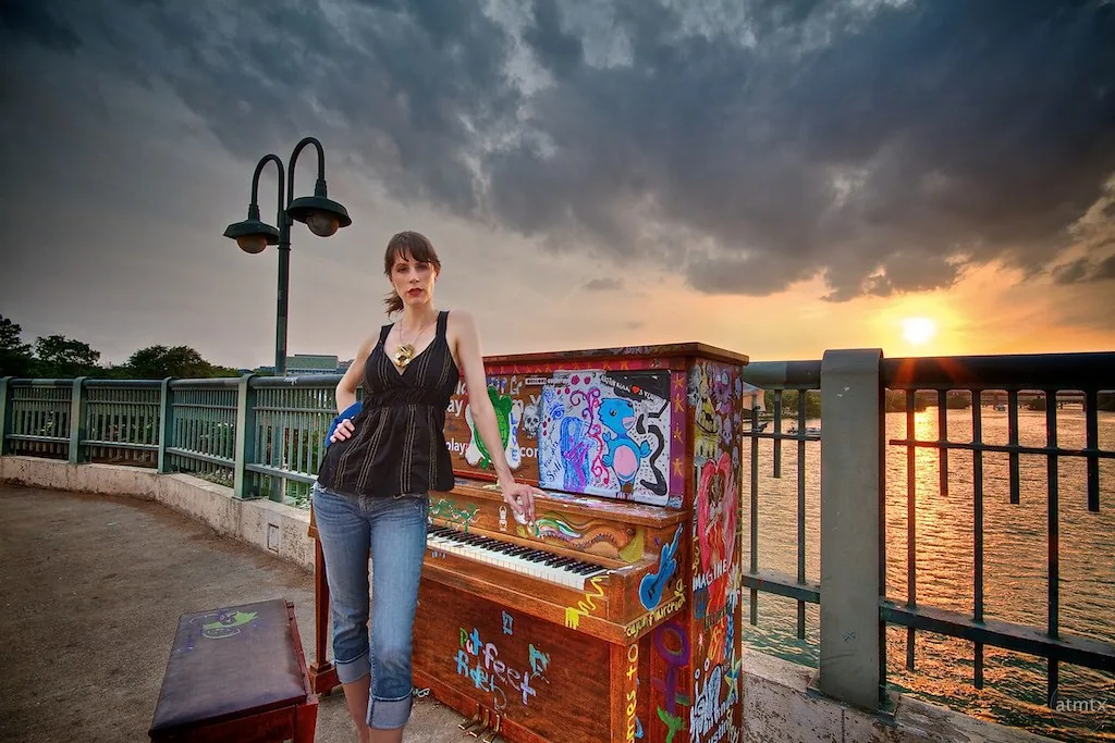 Decorated piano by the water Decorated piano by the water